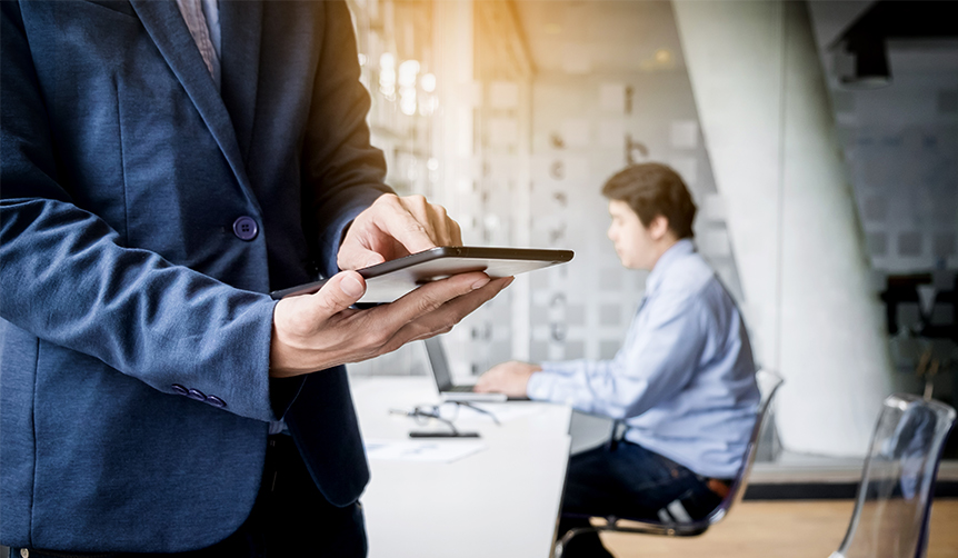 Businessman using Android tablet as a work device