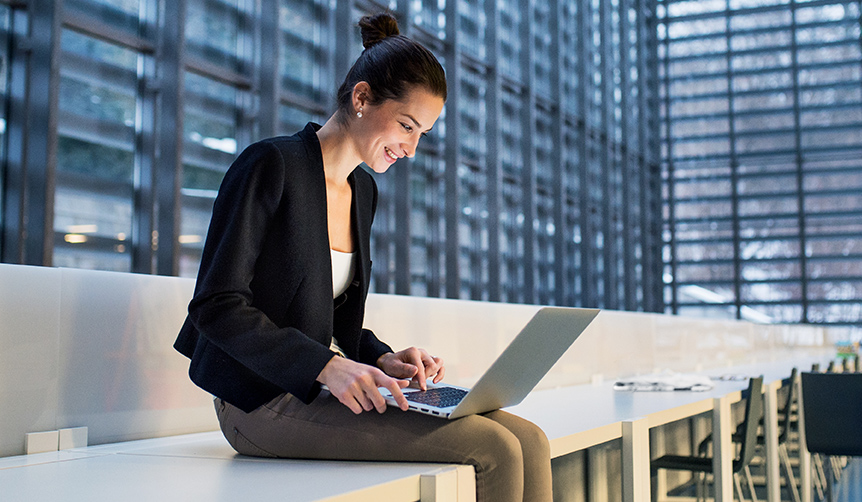 Businesswoman using a managed Mac