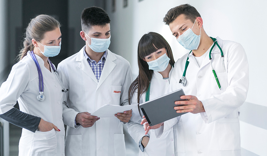 Doctors using tablet locked by Android Kiosk Software for analyzing patient data