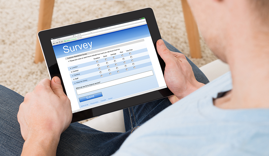 Patient filling a survey in Fire tablet locked into Kiosk Mode