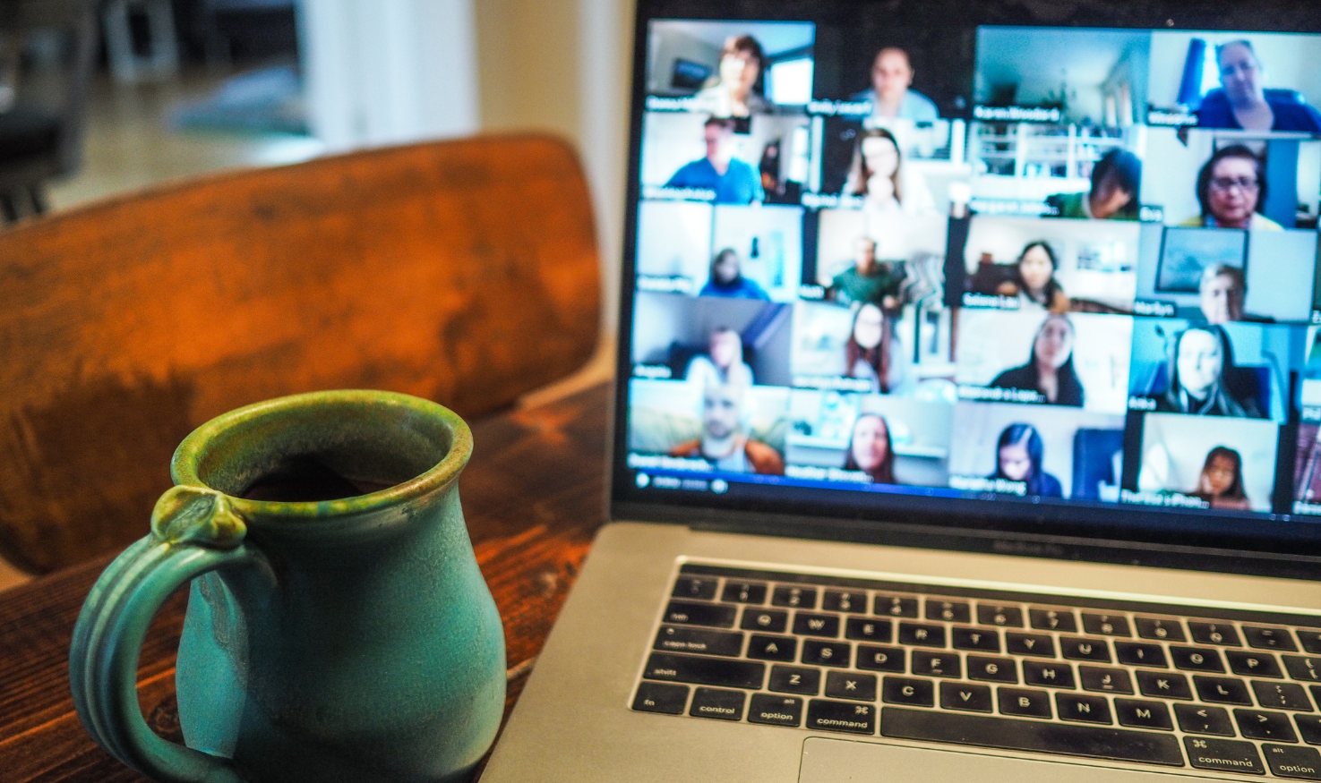 An office meeting through a video conferencing app
