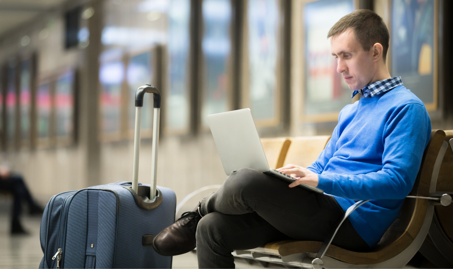 An employee working remotely from a railway station