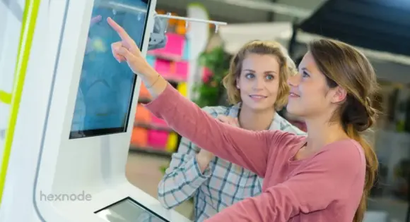 Image of a person using kiosk mode on a public device