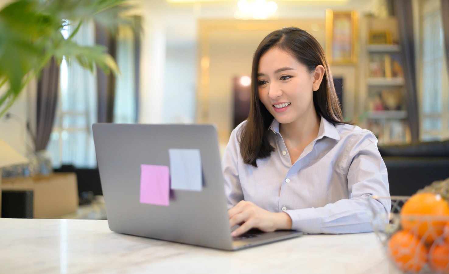 Employee working on a Mac