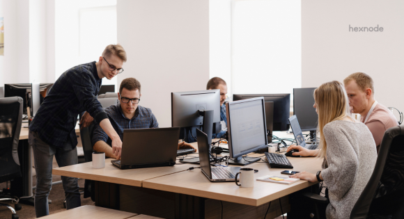 Employees working in an office ensuring cyber security