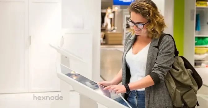 Image of a woman operating a machine in kiosk mode