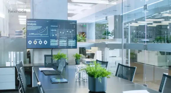 Image of Android TV in kiosk mode put in an office space for presentation.