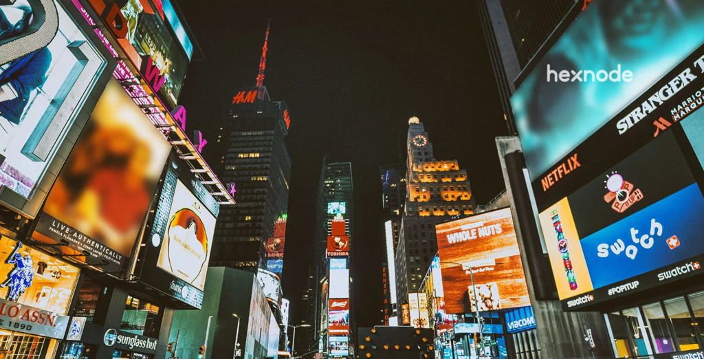 Image of a street having a lot of screens locked in kiosk mode and digital signage.