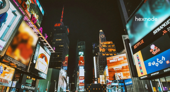 Image of a street having a lot of screens locked in kiosk mode and digital signage.