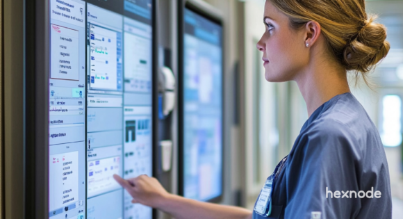 Image of a person using a device locked in kiosk mode in the hospital.