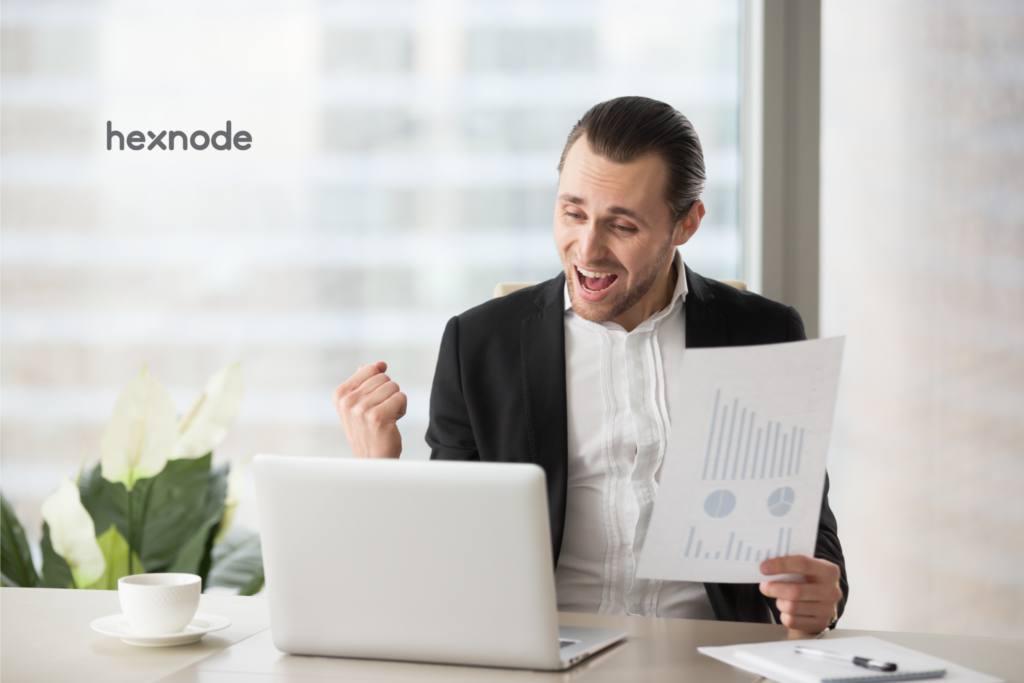 Image of a person holding a profit report.