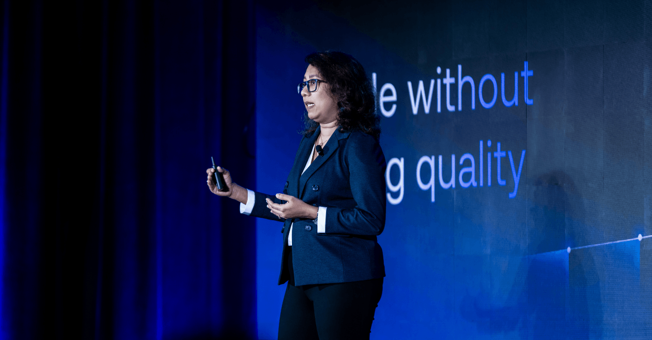 Rachana Vijayan presenting at the HexCon26 keynote, with a slide reading