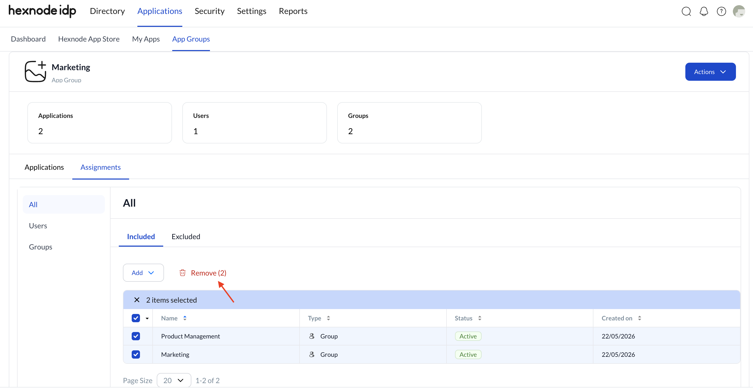 Manage and Assign Users to Applications via App Groups in Hexnode IDP Screenshot of the Hexnode IDP portal showing the App Groups section under the Applications tab. An existing App Group is selected, displaying the Assignments section used to unassign or Assign Users to Applications, with the left-hand menu offering options to view identity categories including All, Users, or Groups. Specific users or groups from the list are selected, and the Remove (x) option is clicked to remove the assignment.