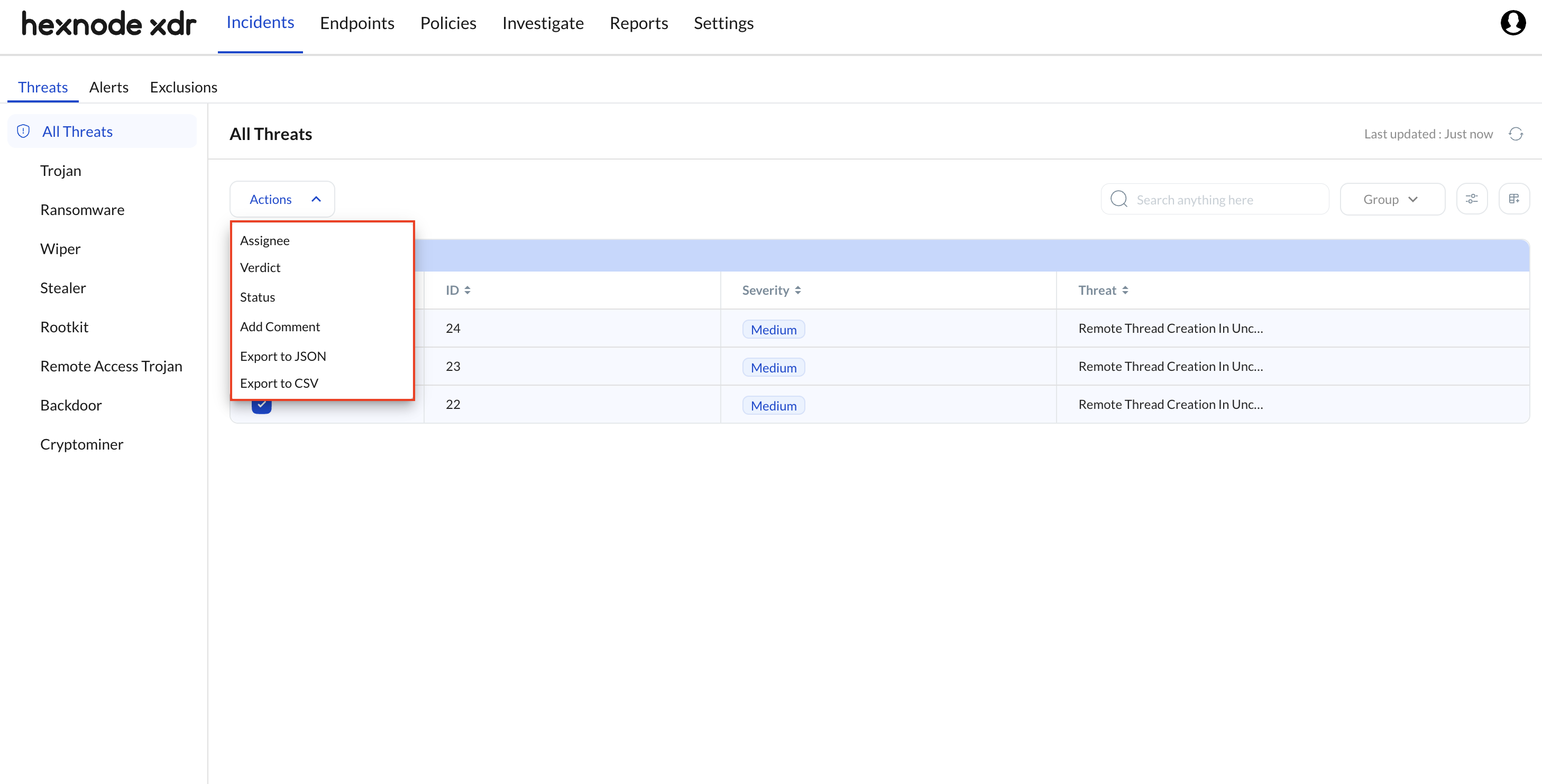 Action Dropdown in the Threats Sub-Tab for xdr threat incidents in Hexnode XDR Screenshot of the Hexnode XDR portal showing the Action drop-down menu located directly within the Threats sub-tab under the Incident tab. This menu allows administrators to apply quick mitigation actions to one or multiple xdr threat incidents directly from the main list.