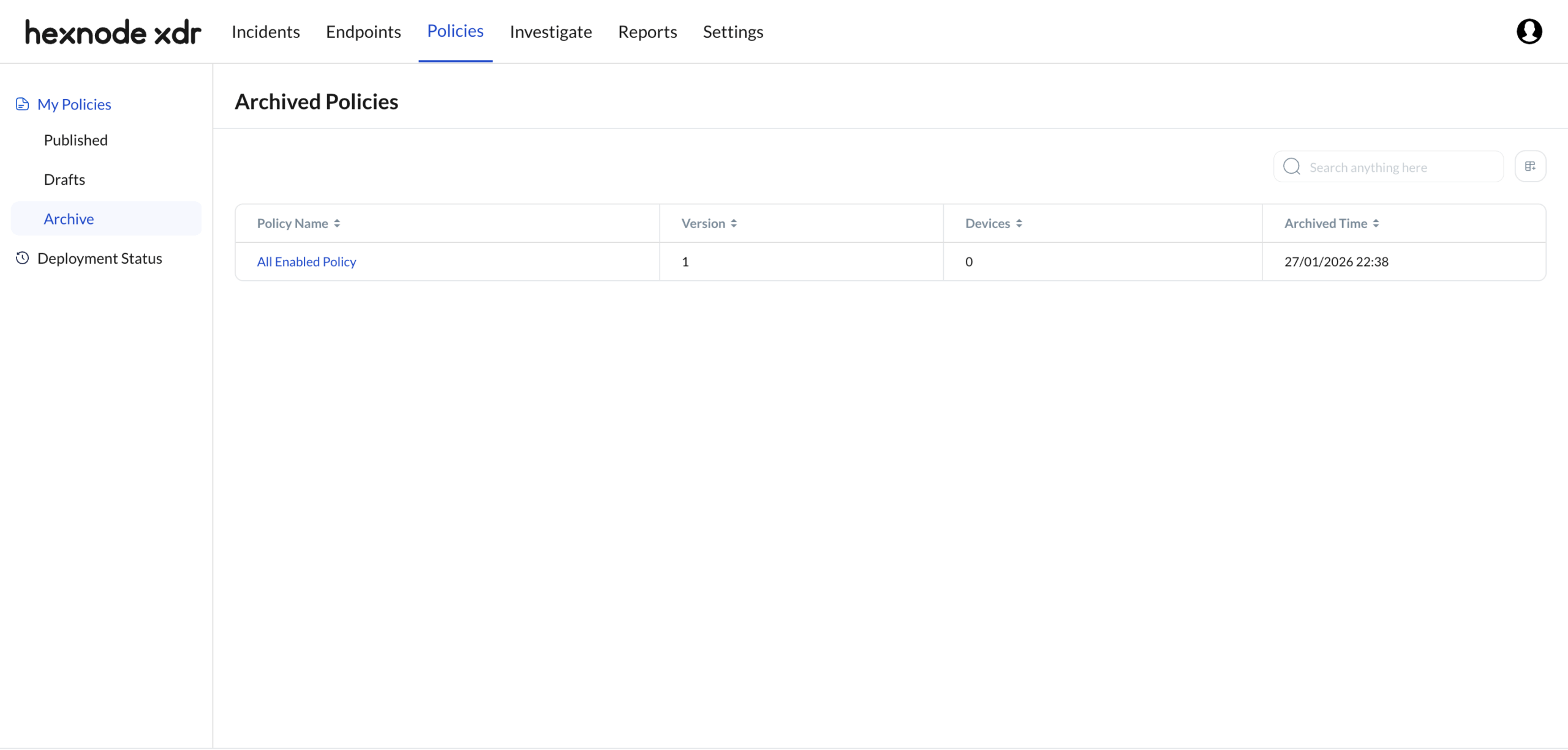 Screenshot of the Hexnode XDR console showing the Archived Policies subtab under Policies tab, located between Endpoints and Investigate tabs.