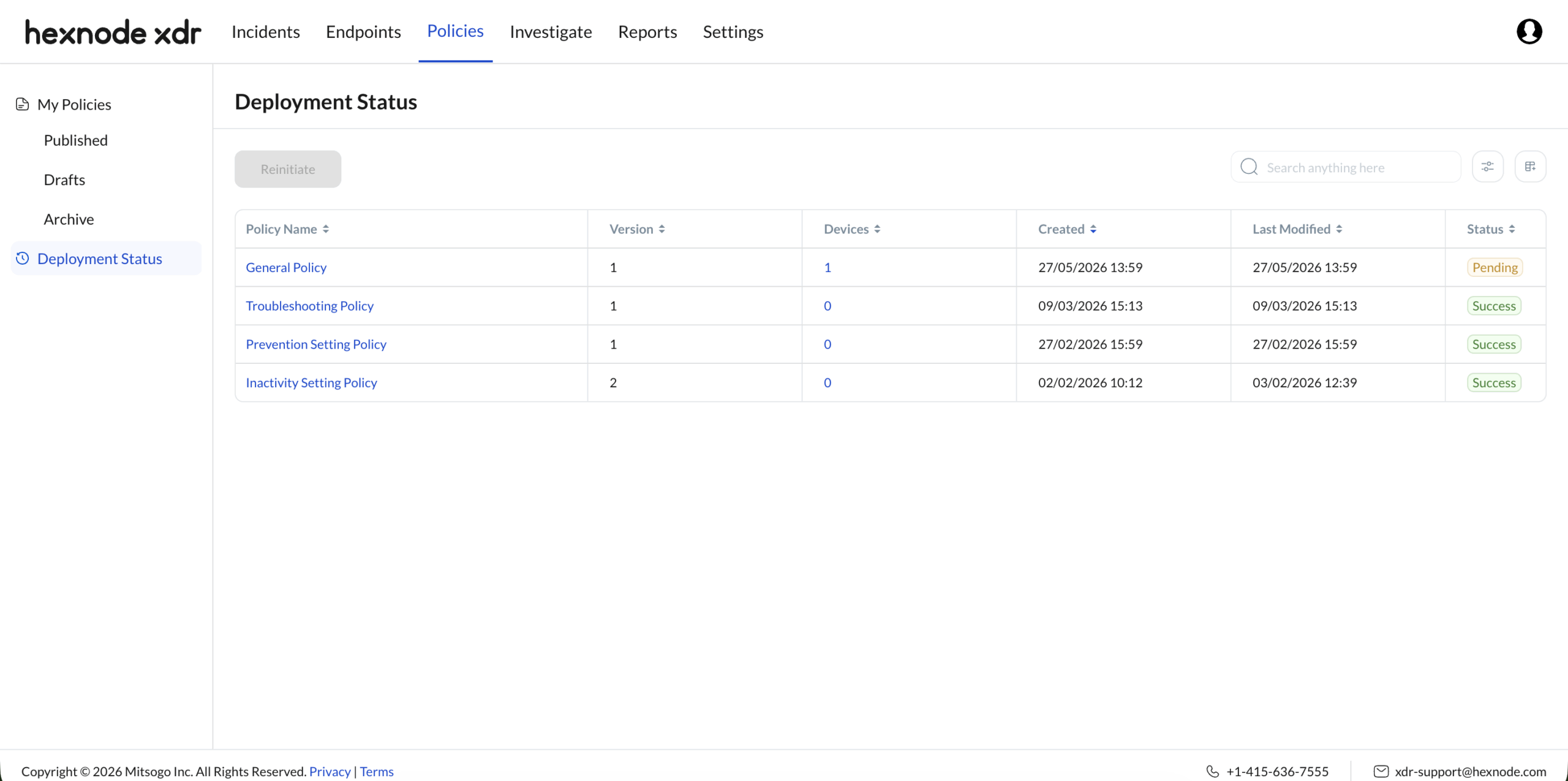 Screenshot showing the Deployment Status subtab under Policies tab in Hexnode XDR console.