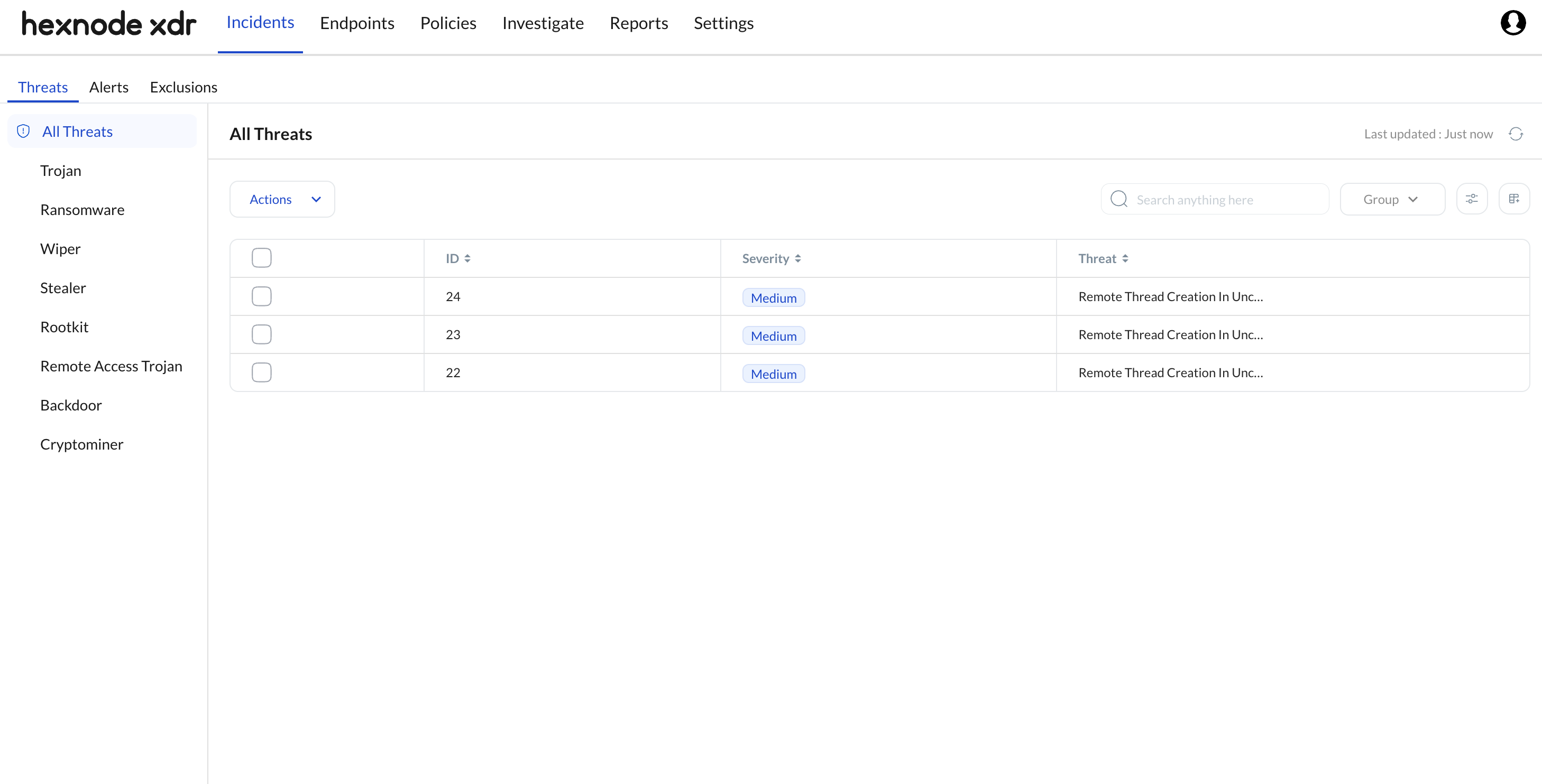 Threats Sub-Tab to View XDR threat incidents in Hexnode XDR Screenshot of the Hexnode XDR portal showing the Threats sub-tab under the Incident tab. This section displays a comprehensive list of active XDR threat incidents detected within the environment.