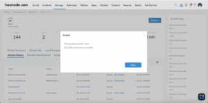 Hexnode UEM Action History displaying the execution status for a PowerShell script disabling Microsoft Account on Windows device.