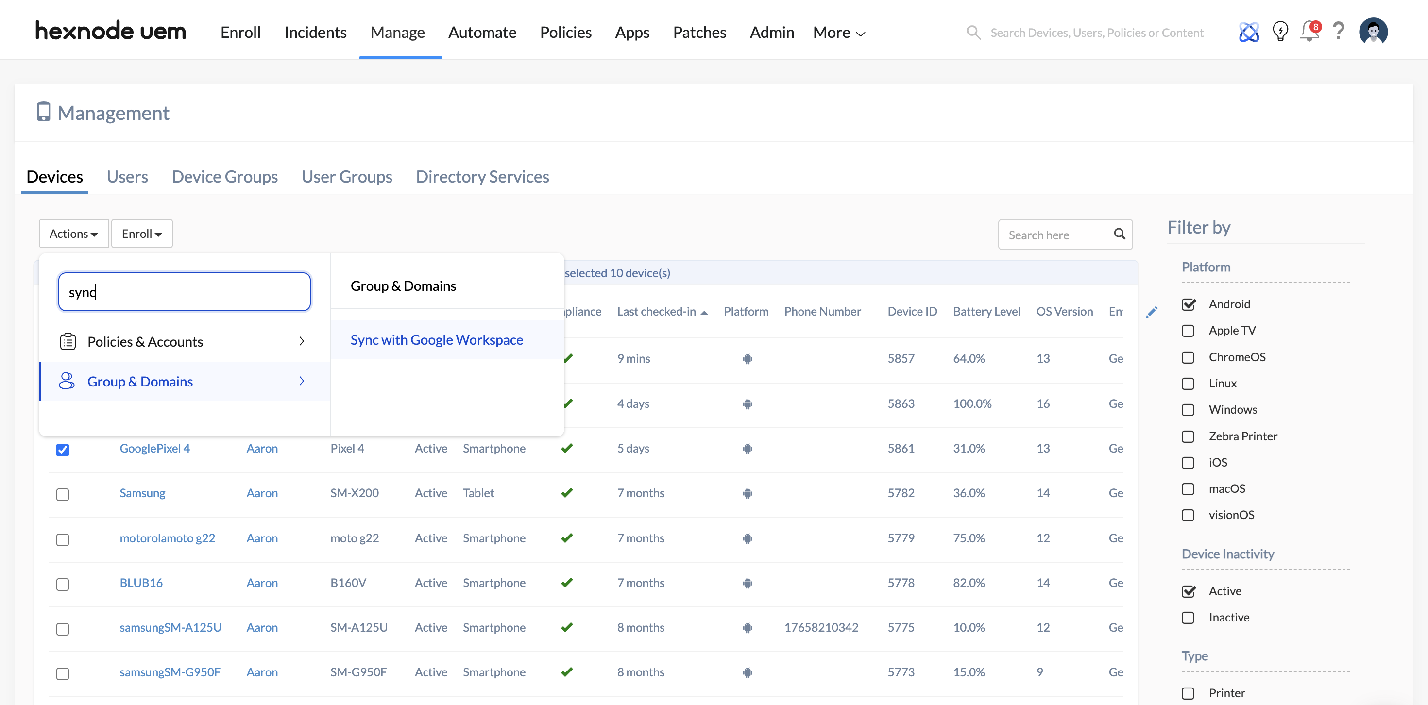 Sync with Google Workspace remote action for dynamic policy application Screenshot of Hexnode UEM console showing the Manage tab. Multiple bulk devices are checked under the Devices sub-tab, and the Actions dropdown menu is open. Under the Group & Domains category, the Sync with Google Workspace remote action is highlighted and selected for execution across the chosen devices