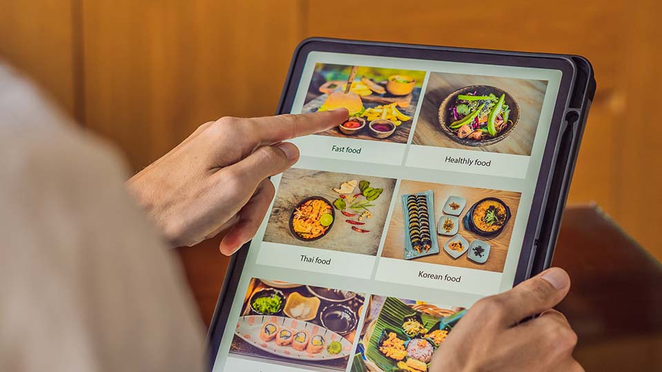 Enhancing sales in restaurant business with digital menu displays on tablets controlled by Hexnode
